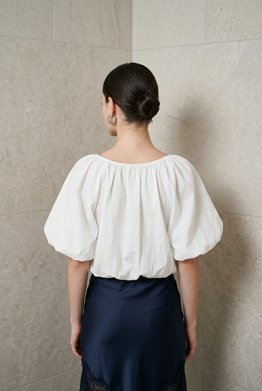 BLUSA MANGA ABULTADA MOÑITOS