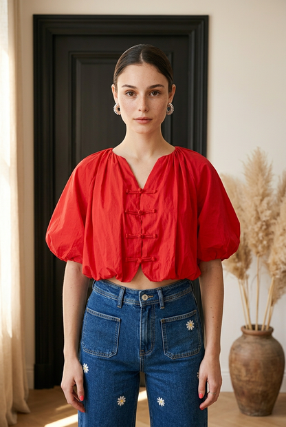 BLUSA MANGA ABULTADA MOÑOS